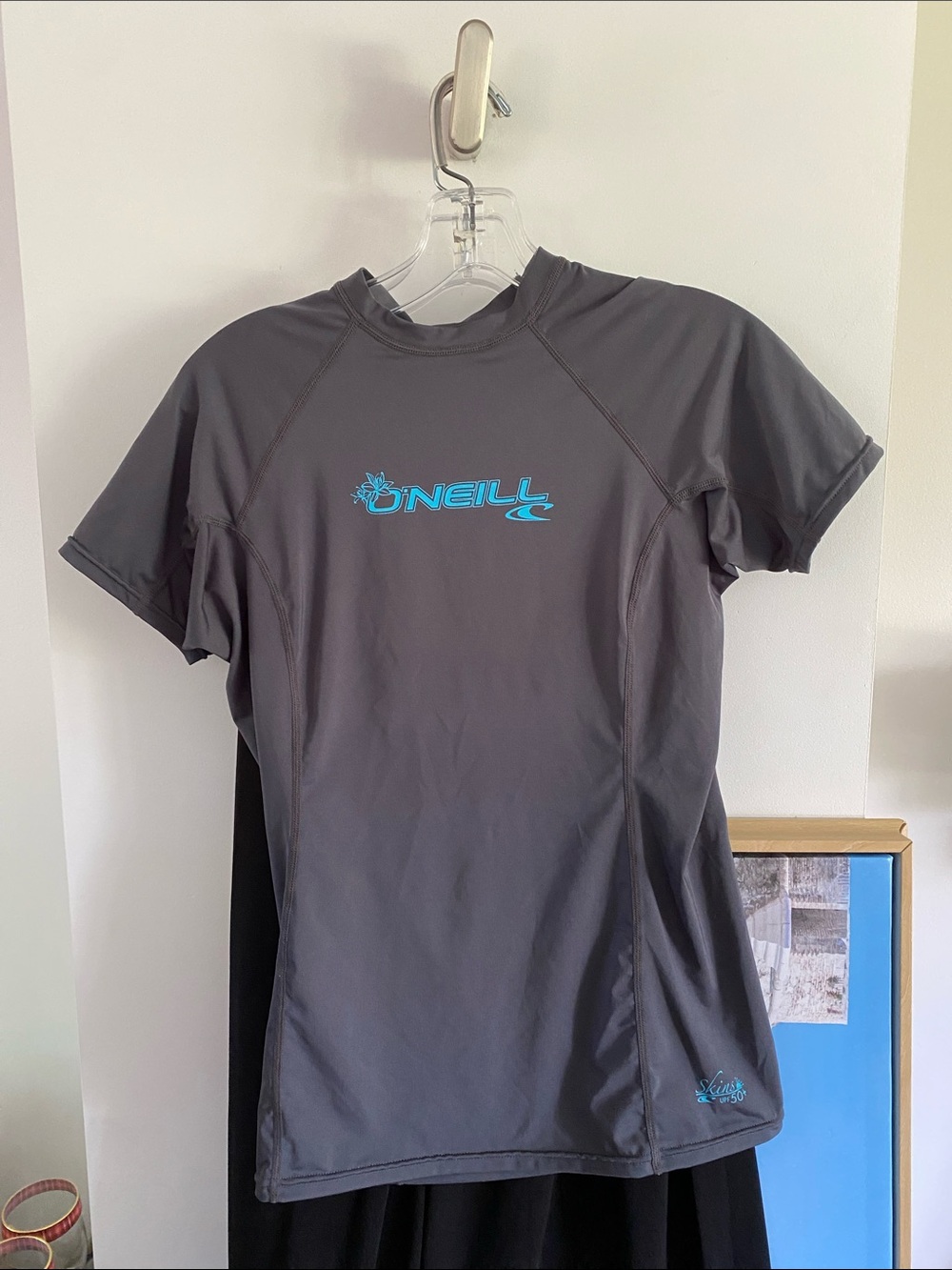 O'Neill Women's Short Sleeve Rash Guard in Gray with Teal Logo